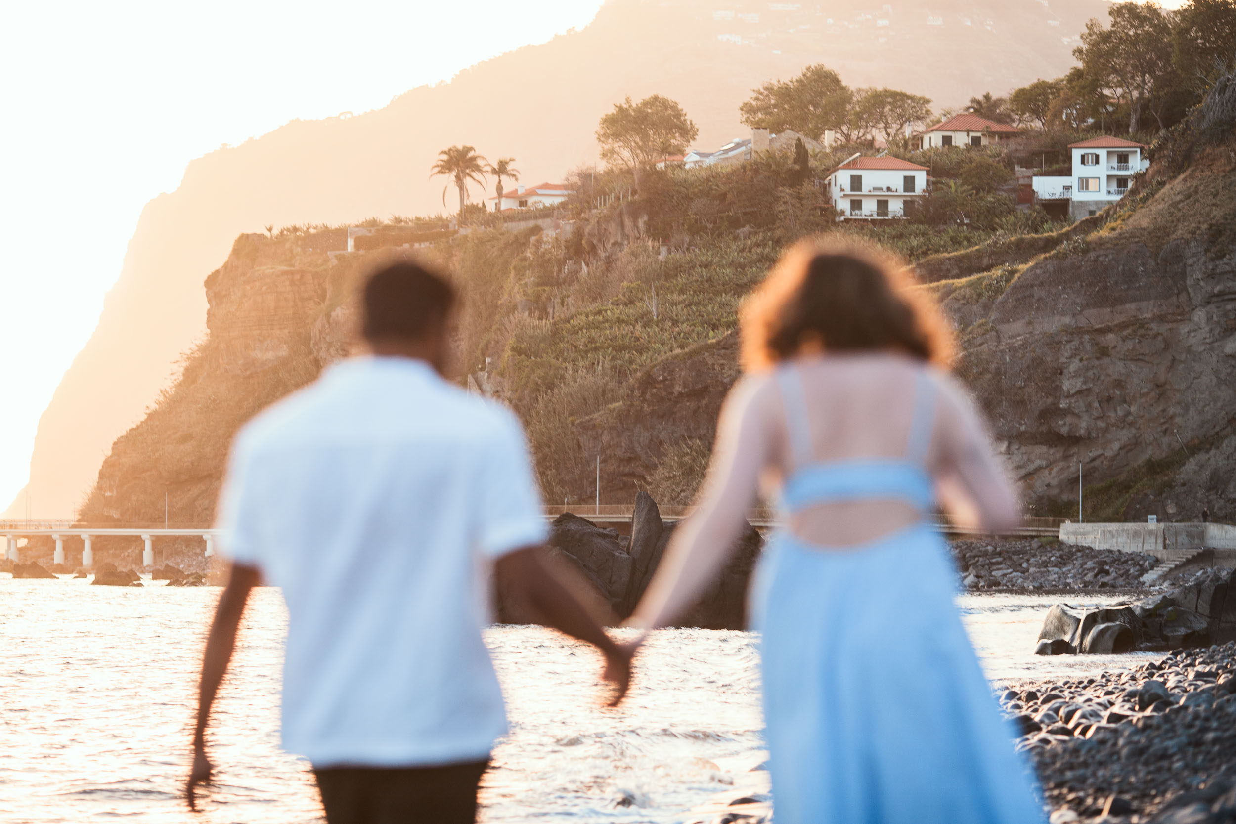 Couple kissing at Praia Formosa, Funchal, Madeira