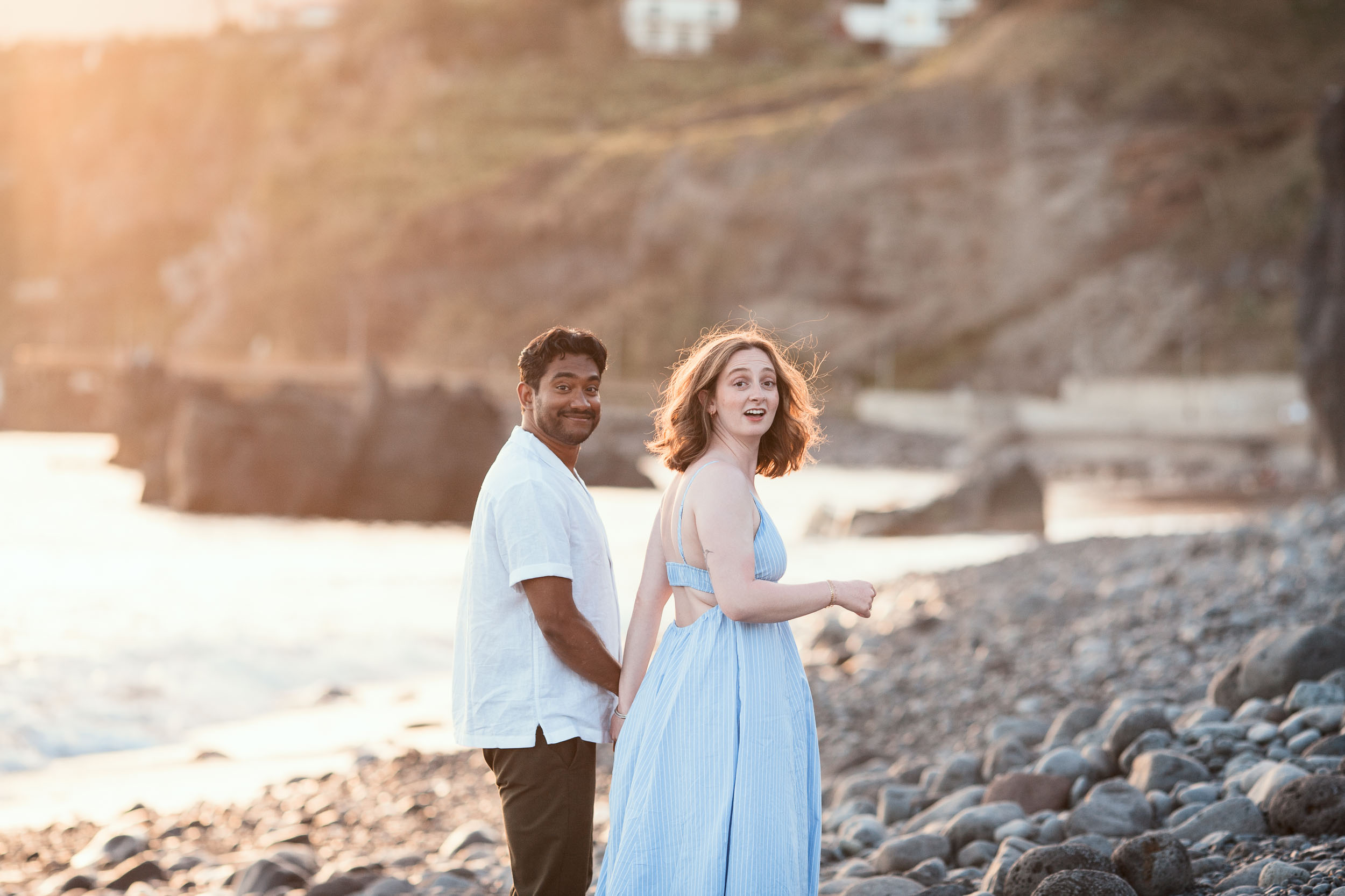 Woman with engagement ring at Praia Formosa beach, Madeira