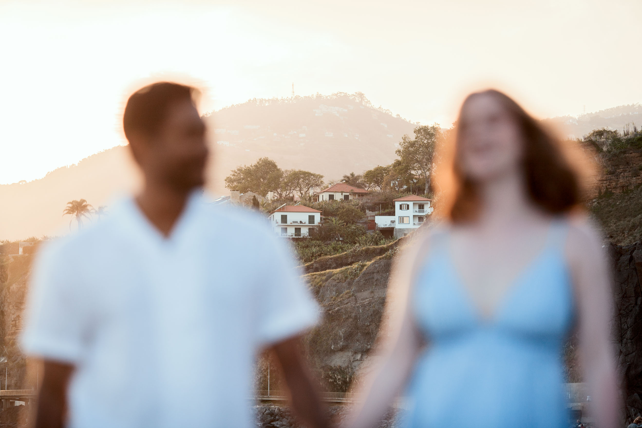 Couple silhouette at dusk, Praia Formosa beach, Madeira