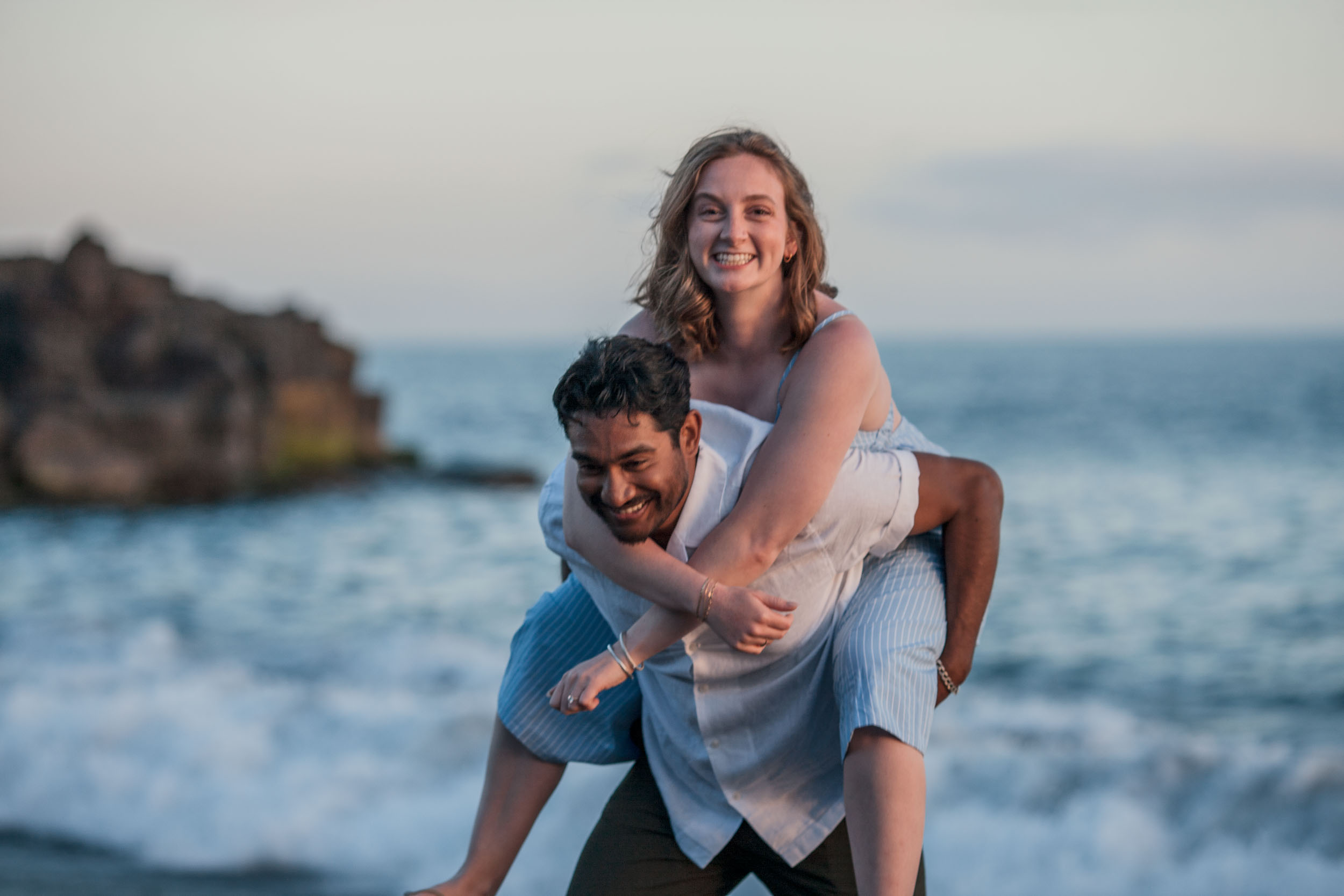 Engagement photos at Praia Formosa sunset, Funchal, Madeira