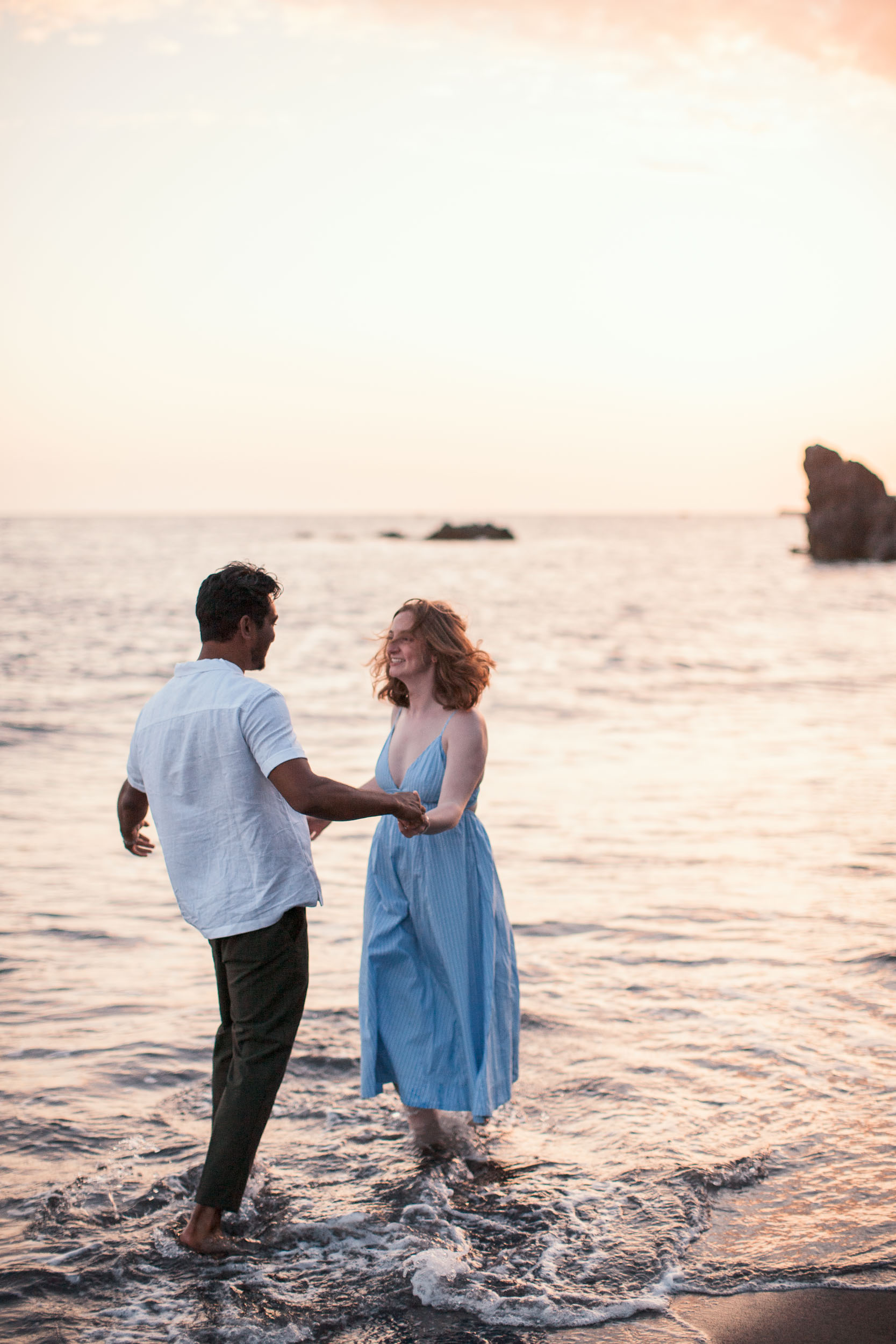 Engagement photos at Praia Formosa sunset, Funchal, Madeira