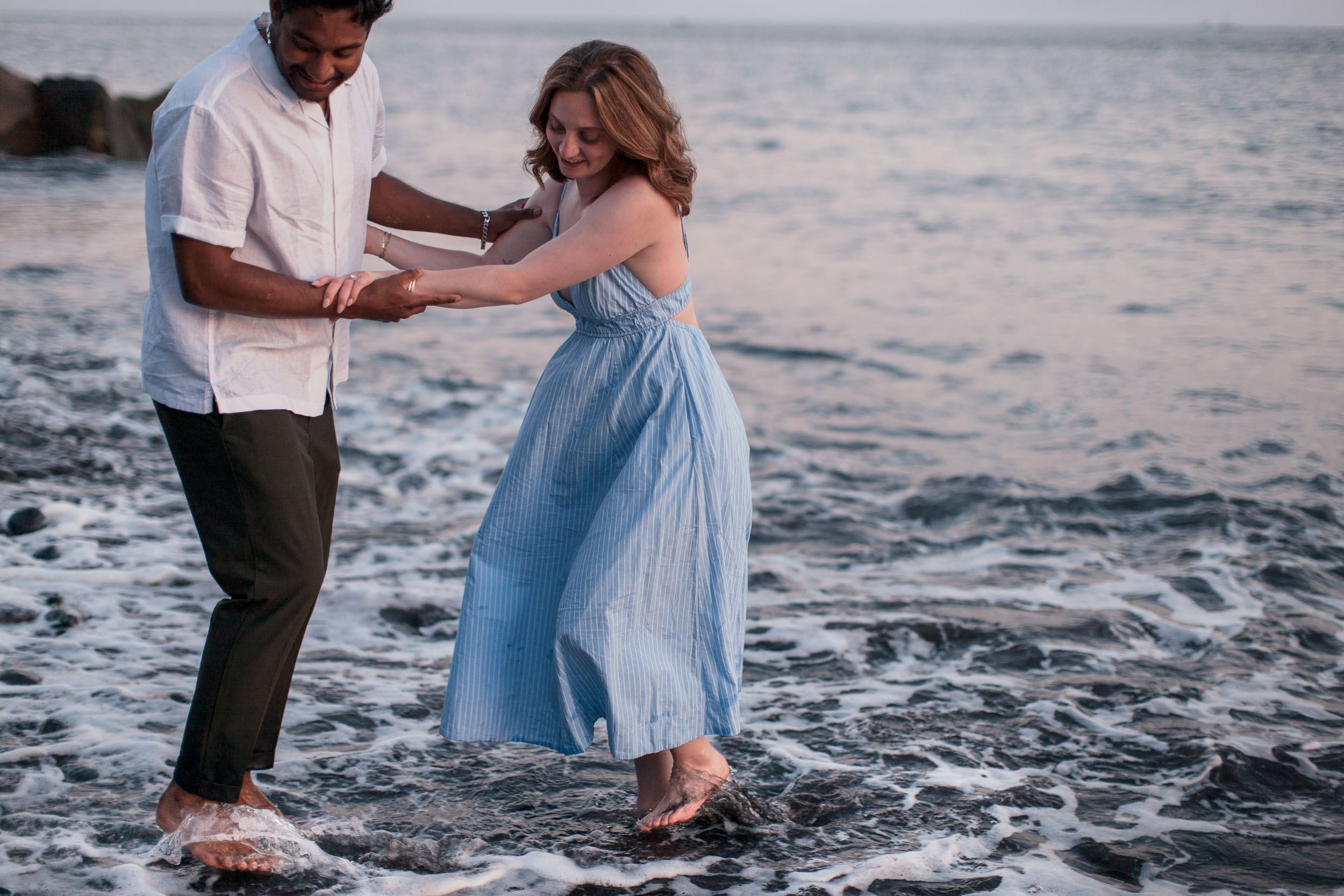 Engagement photos at Praia Formosa sunset, Funchal, Madeira