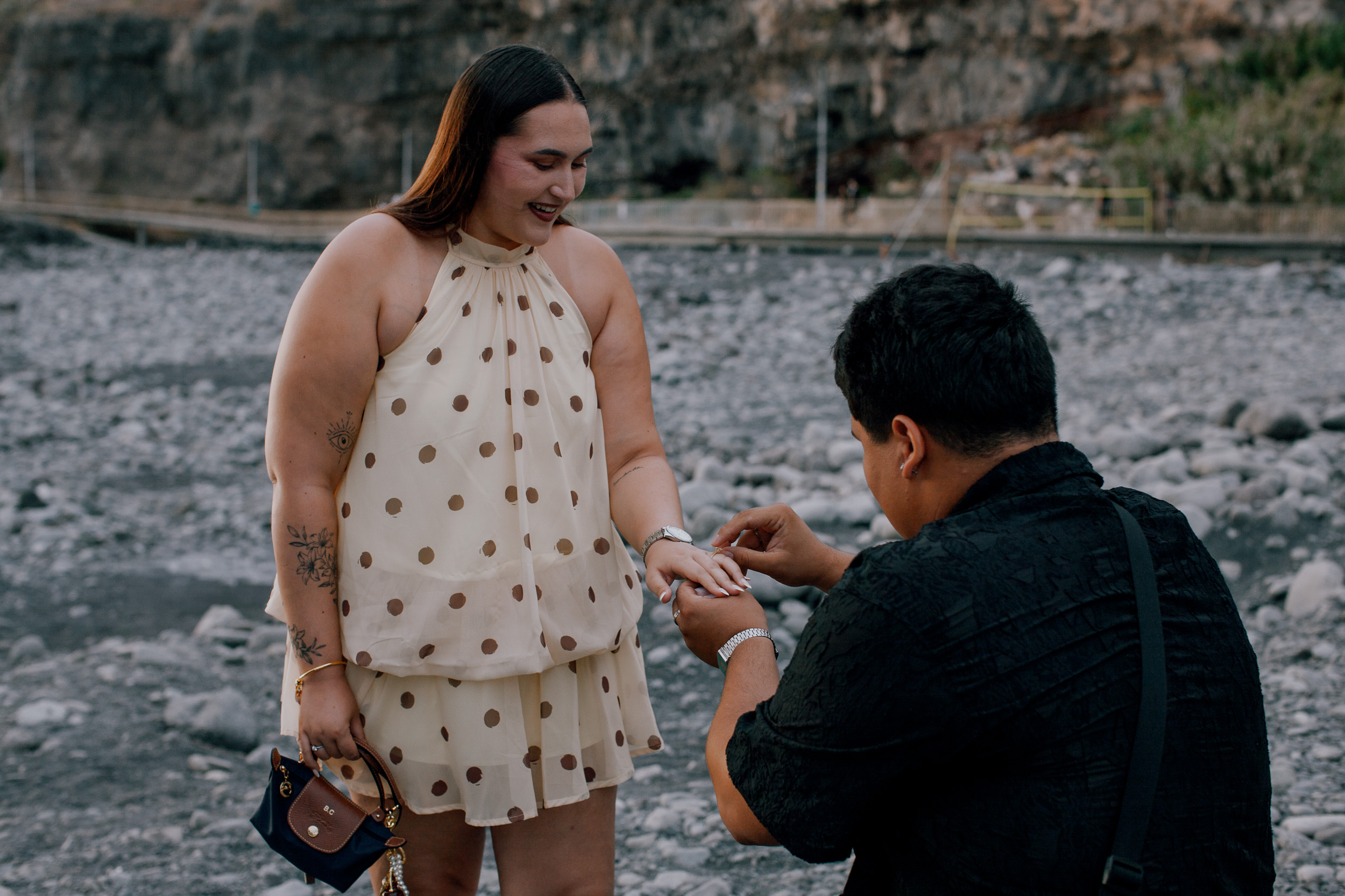 Sliding the engagement ring onto her finger moments after she said yes, Praia Formosa, Madeira