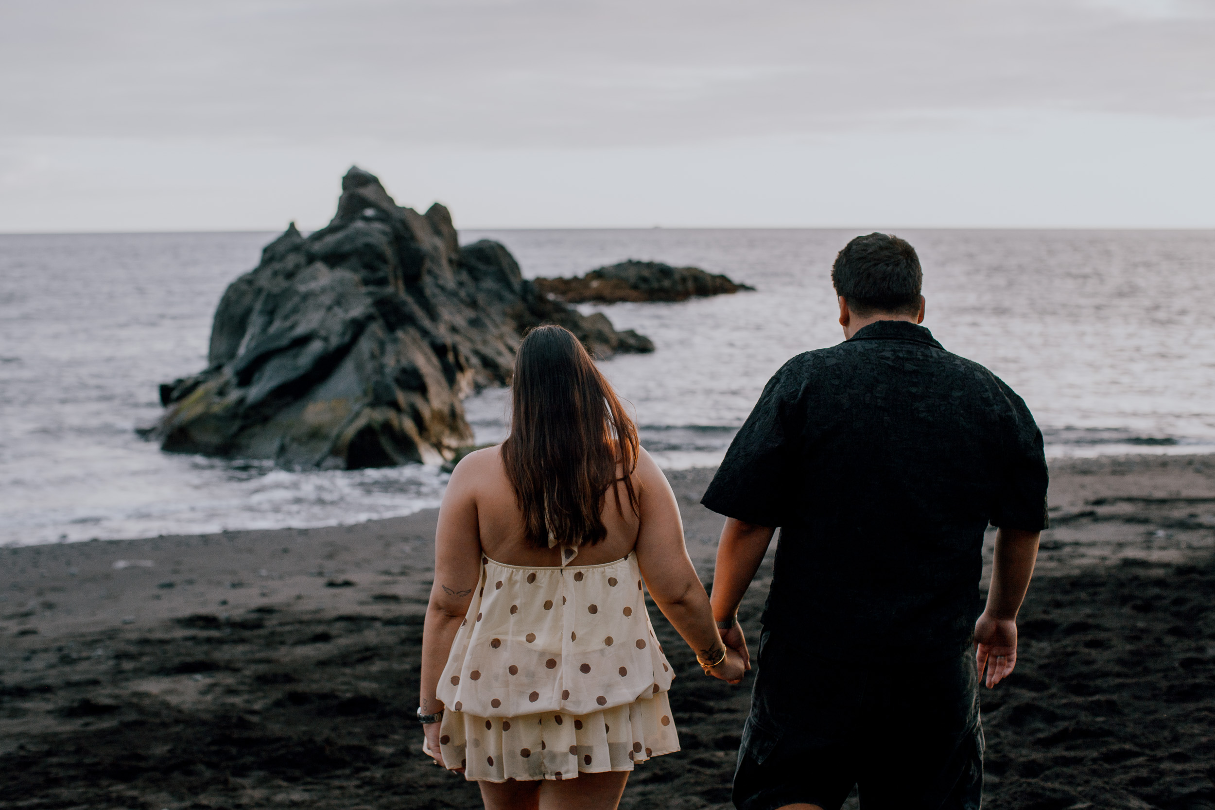 Walking toward the sea stack at the west end of Praia Formosa after the proposal, Madeira