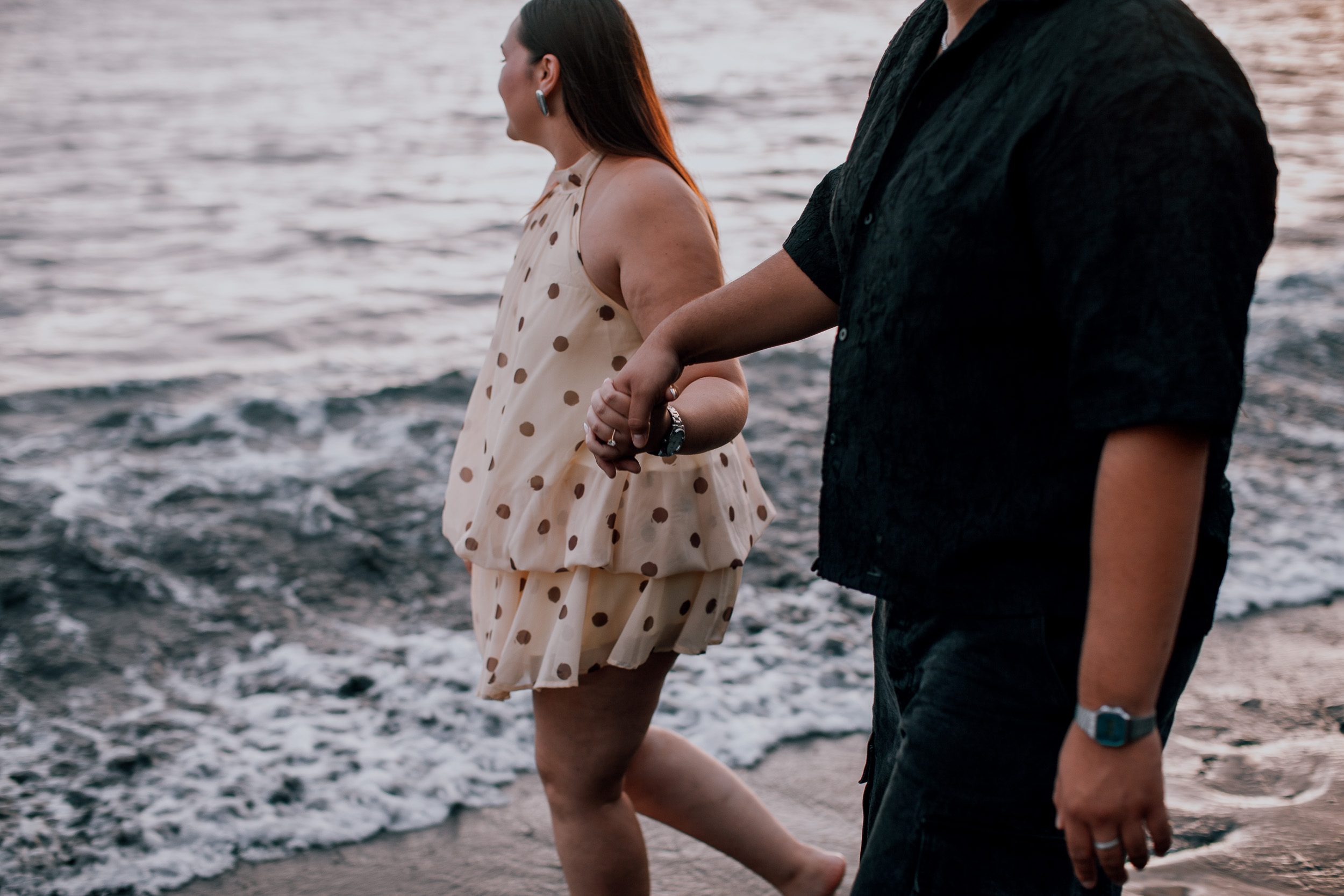 Wading through the shallows hand in hand at the end of the day, Madeira