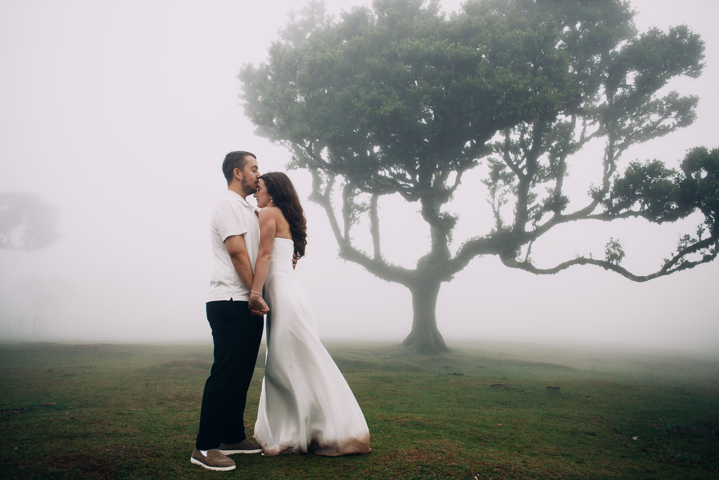 Hem of a white dress darkened by wet ground during a session on the Fanal plateau, Madeira