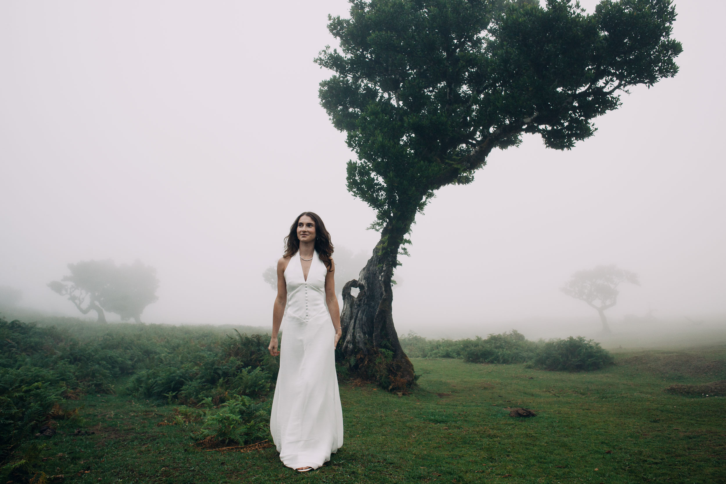 Woman walking toward the camera on the Fanal plateau, Madeira