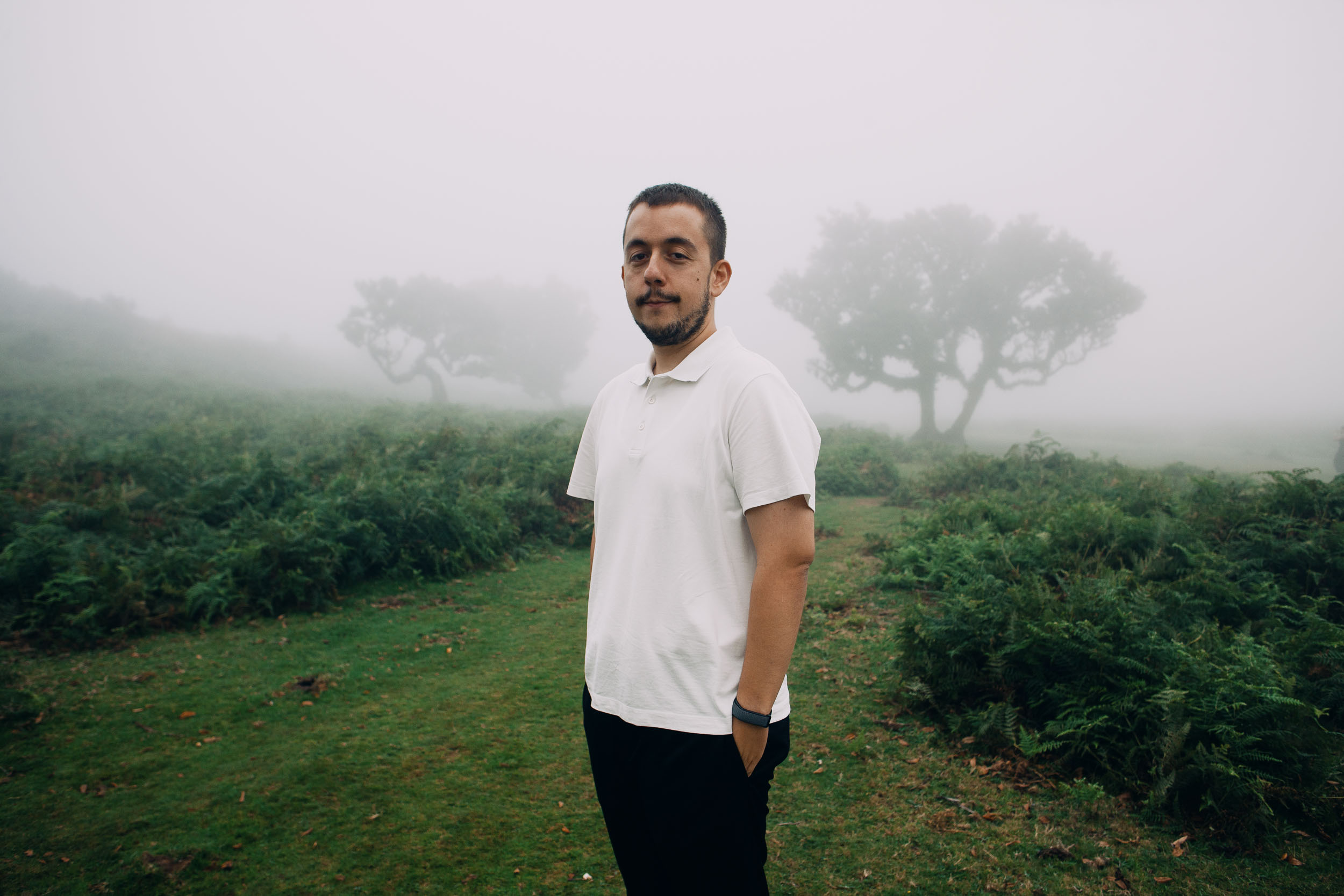 Portrait of the groom in a white polo among the laurels, Fanal Forest, Madeira