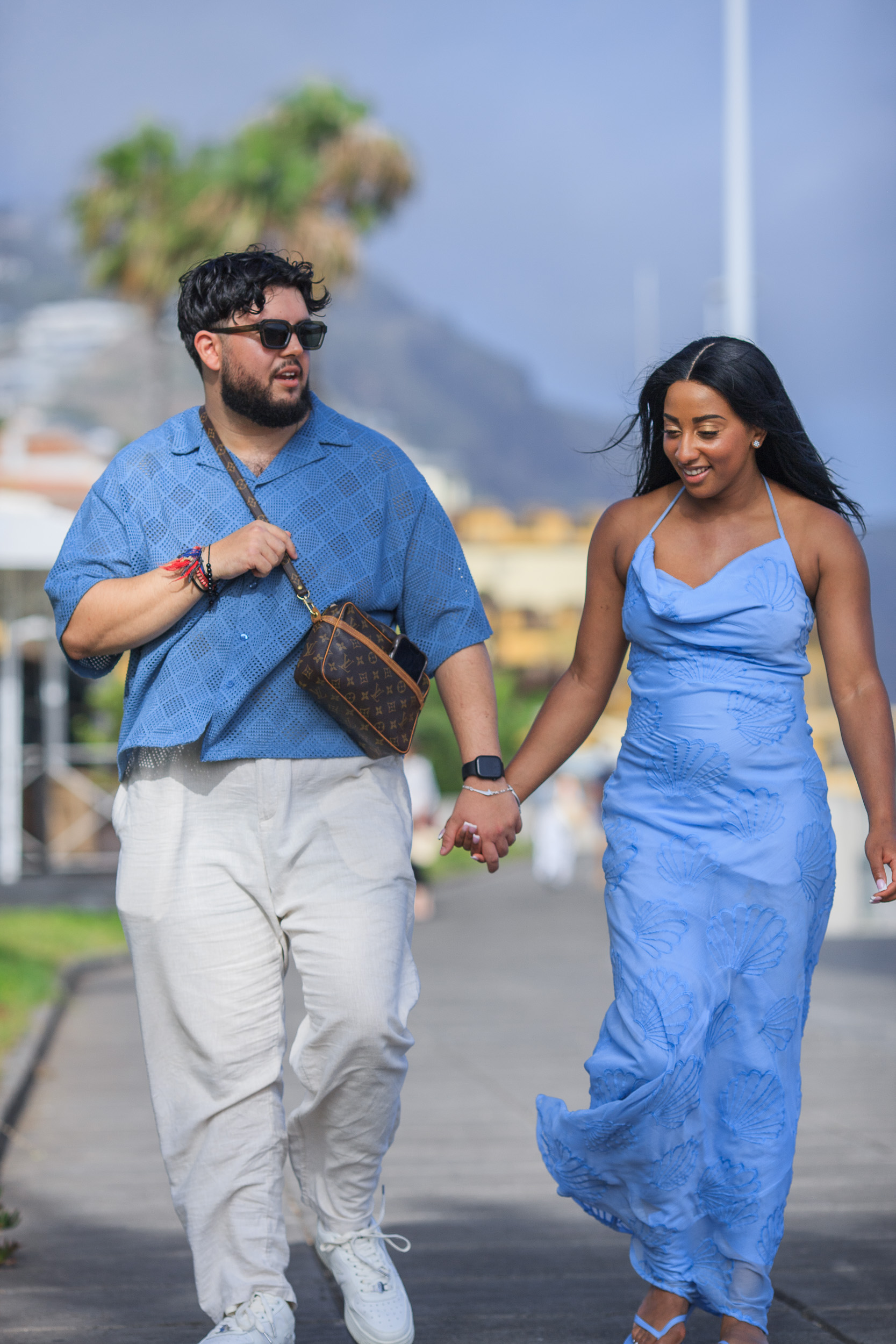 Walking through the old town together, just engaged, Funchal, Madeira