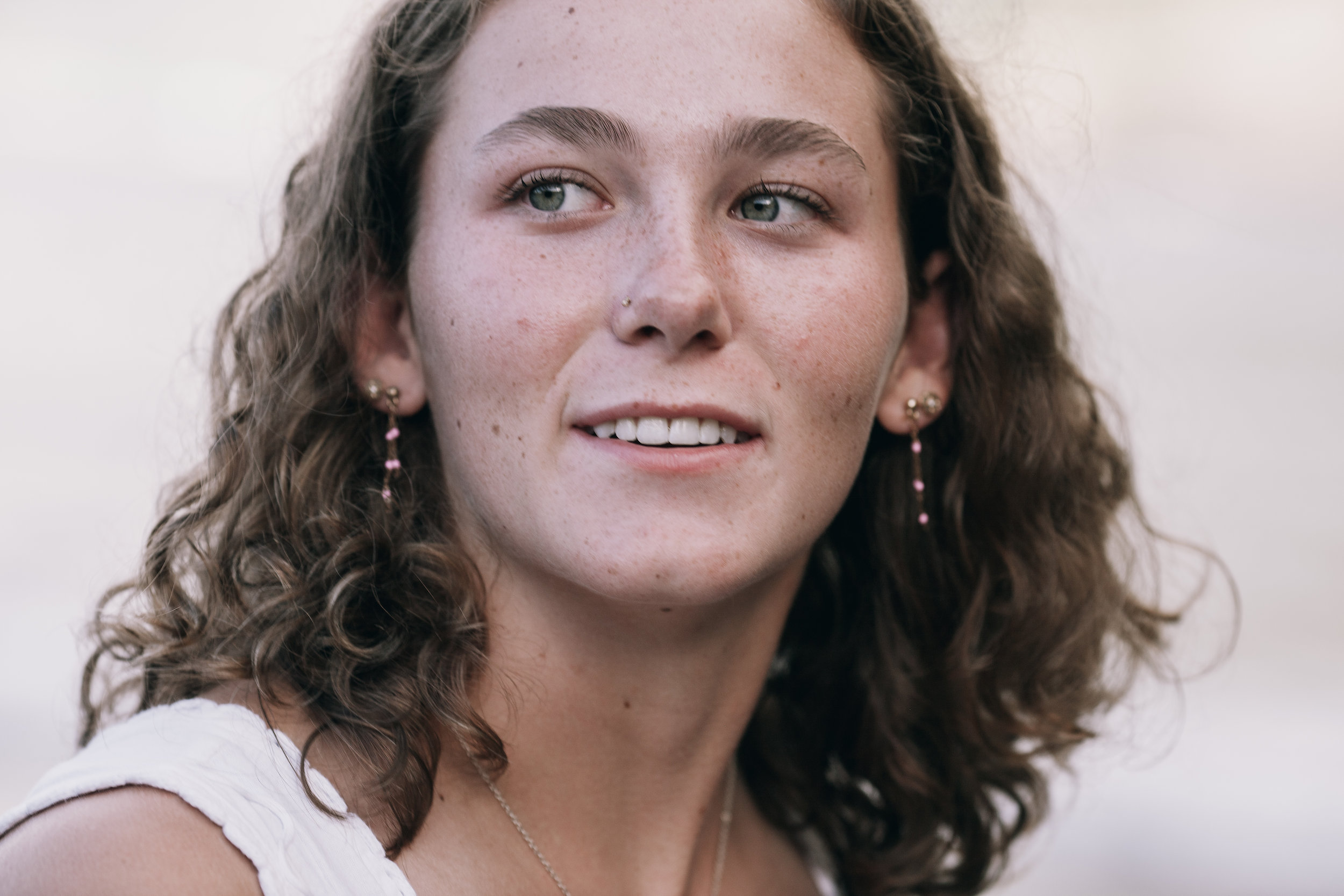 Portrait of the daughter with wind in her hair at Seixal, Madeira