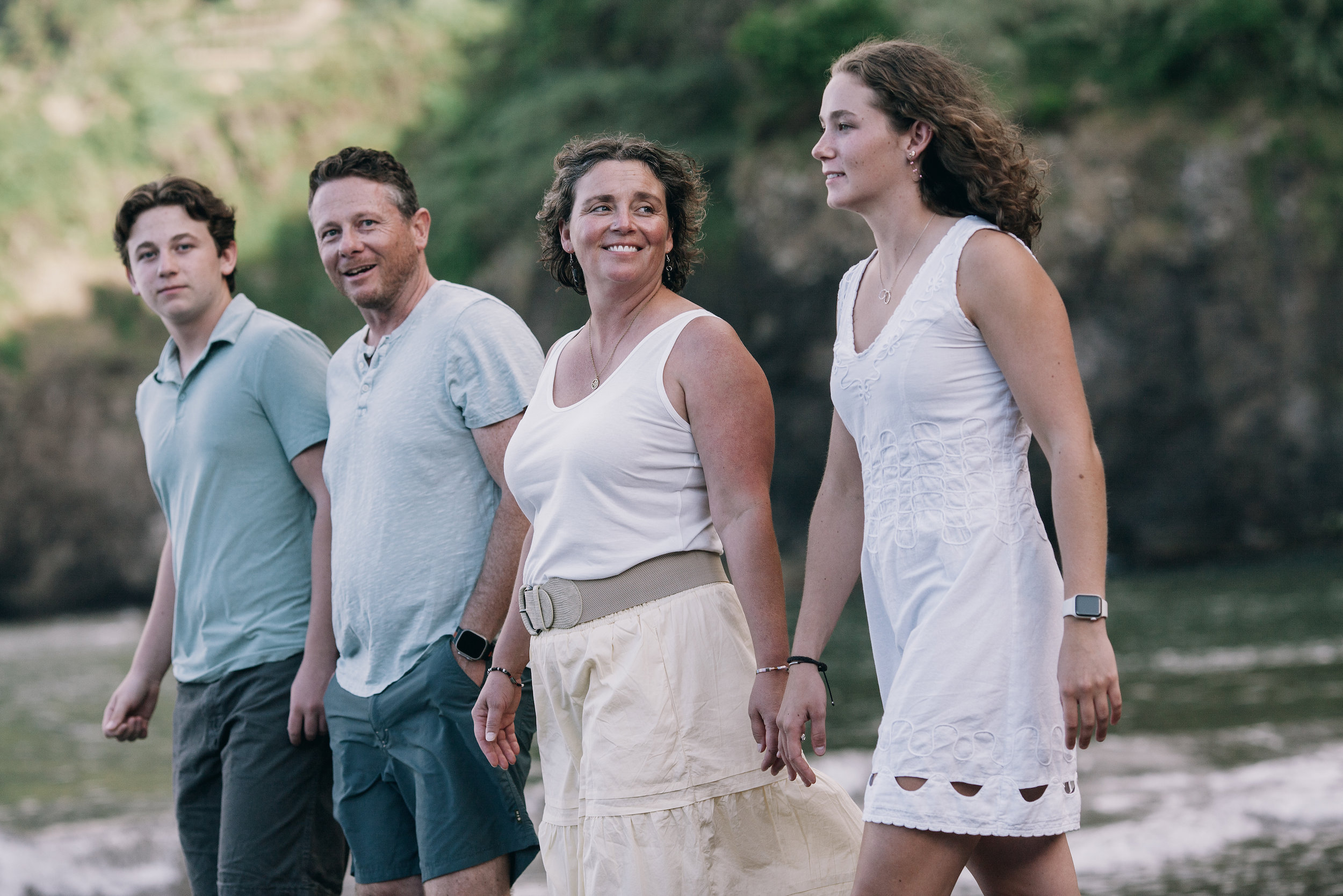 The four of them mid-laugh walking off the beach, Seixal, Madeira