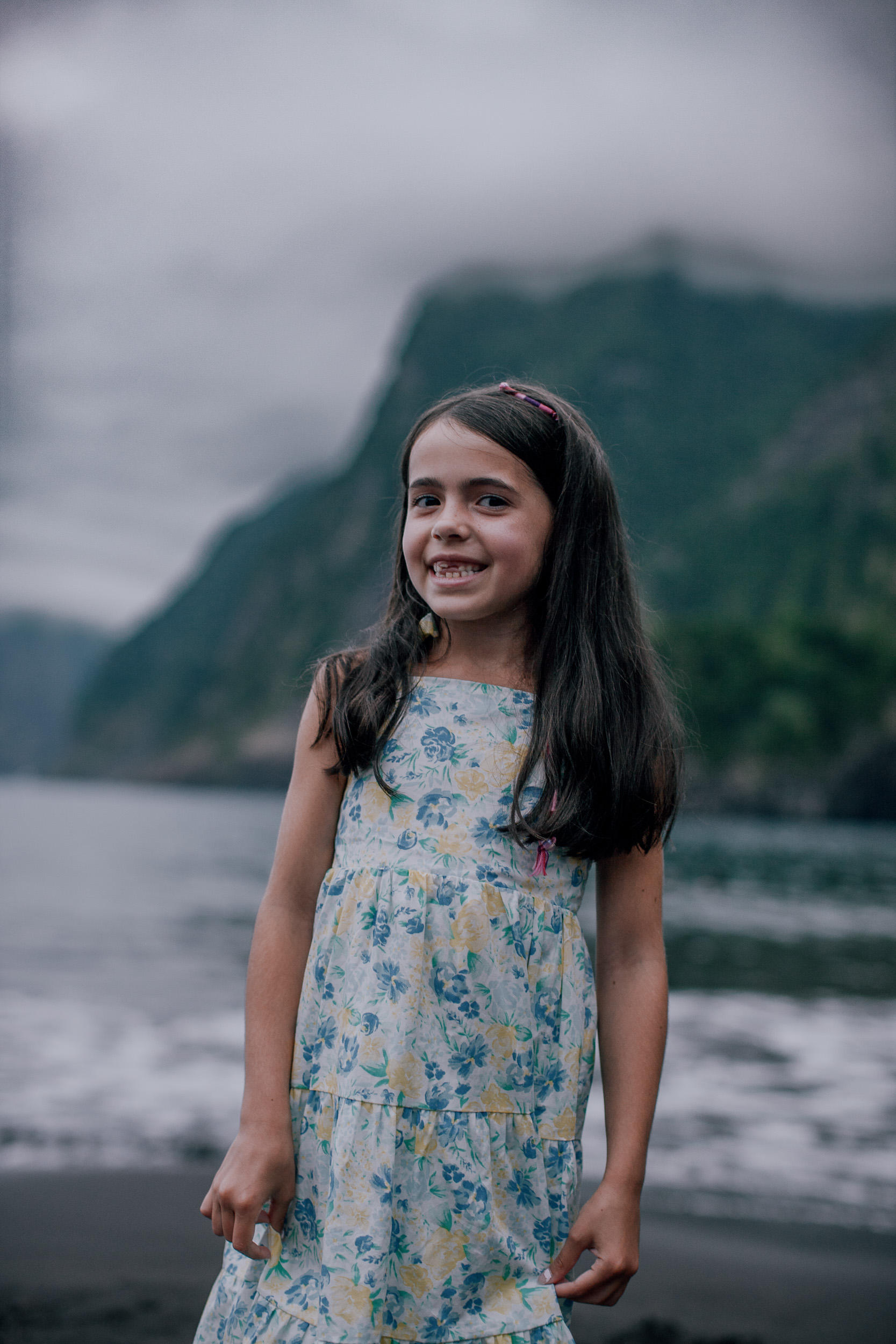 Portrait of the younger daughter in her flower dress, Seixal Beach, Madeira