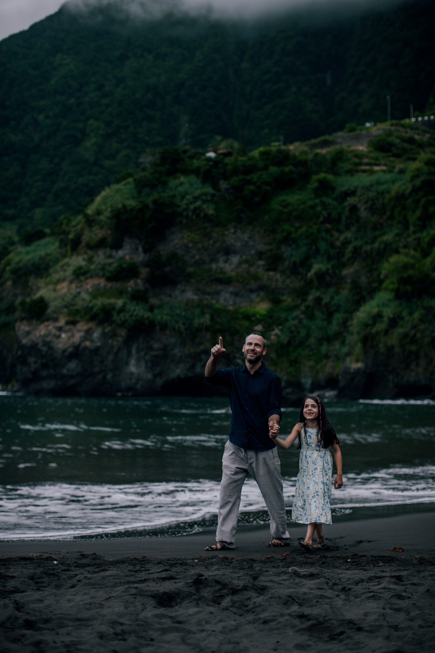 Father giving a thumbs up with the younger daughter, Seixal Beach, Madeira