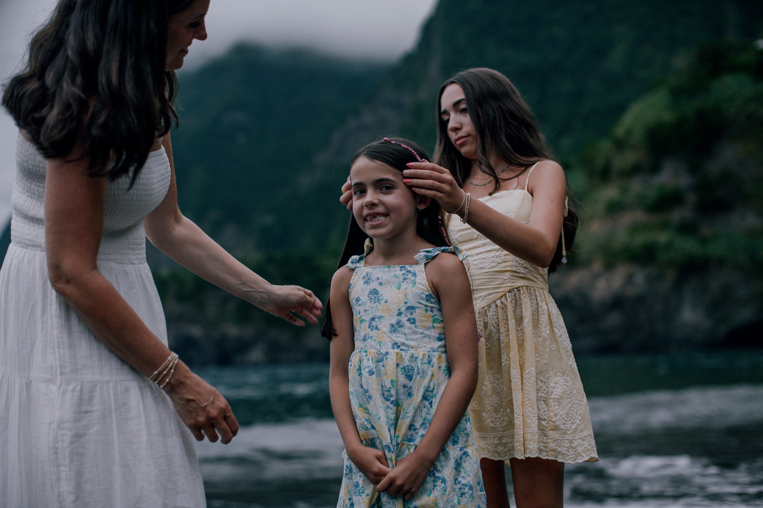 Mum fixing the girls' hair on the beach, Seixal, Madeira