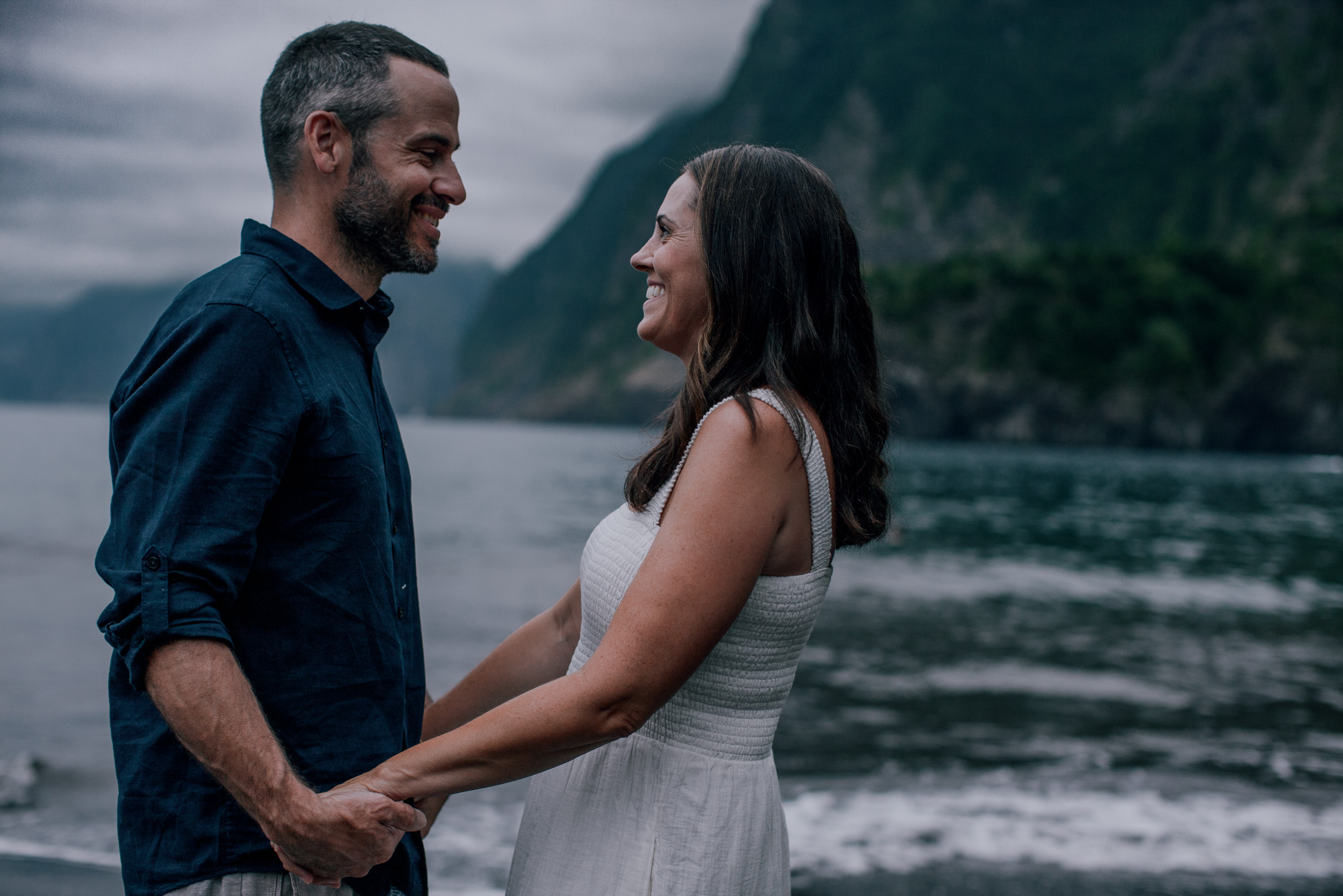 Husband and wife face to face at the surf, Seixal, Madeira