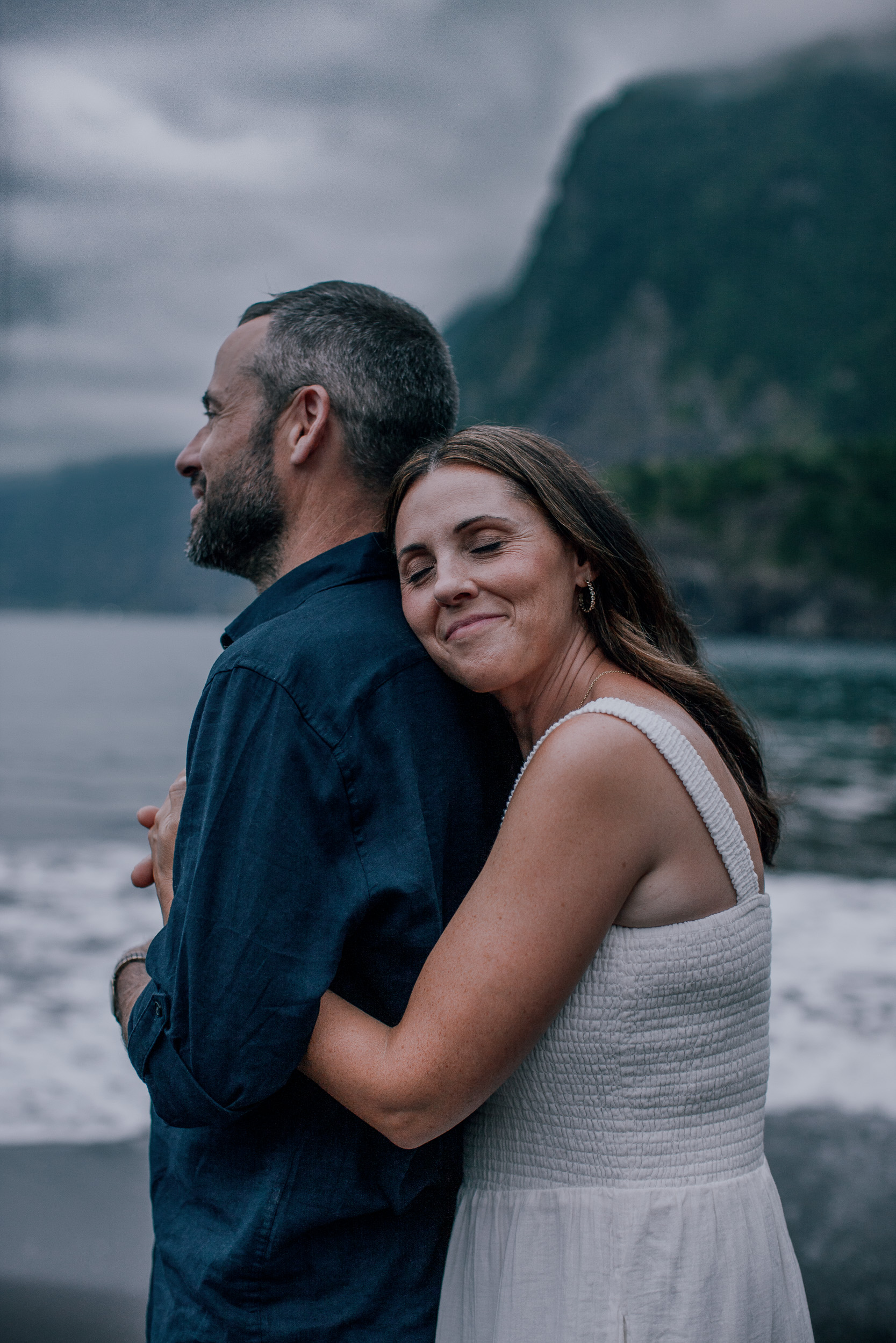 Quiet embrace at dusk on the volcanic sand, Seixal Beach, Madeira