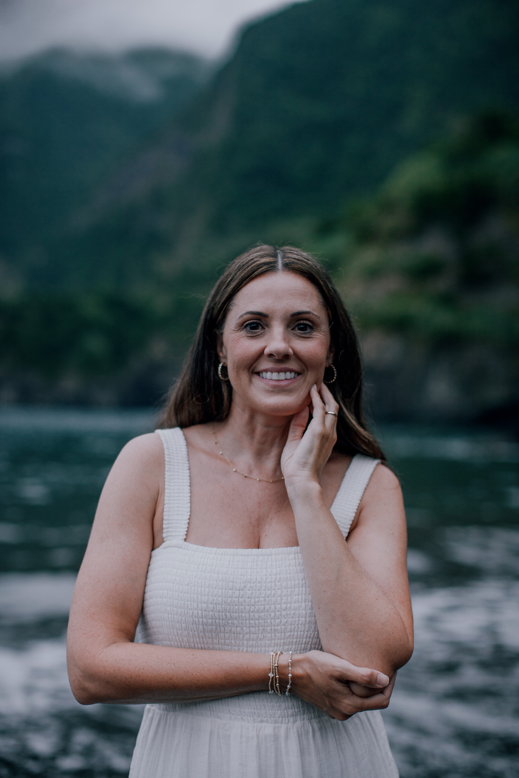 Portrait of the mother smiling on the evening beach, Seixal, Madeira