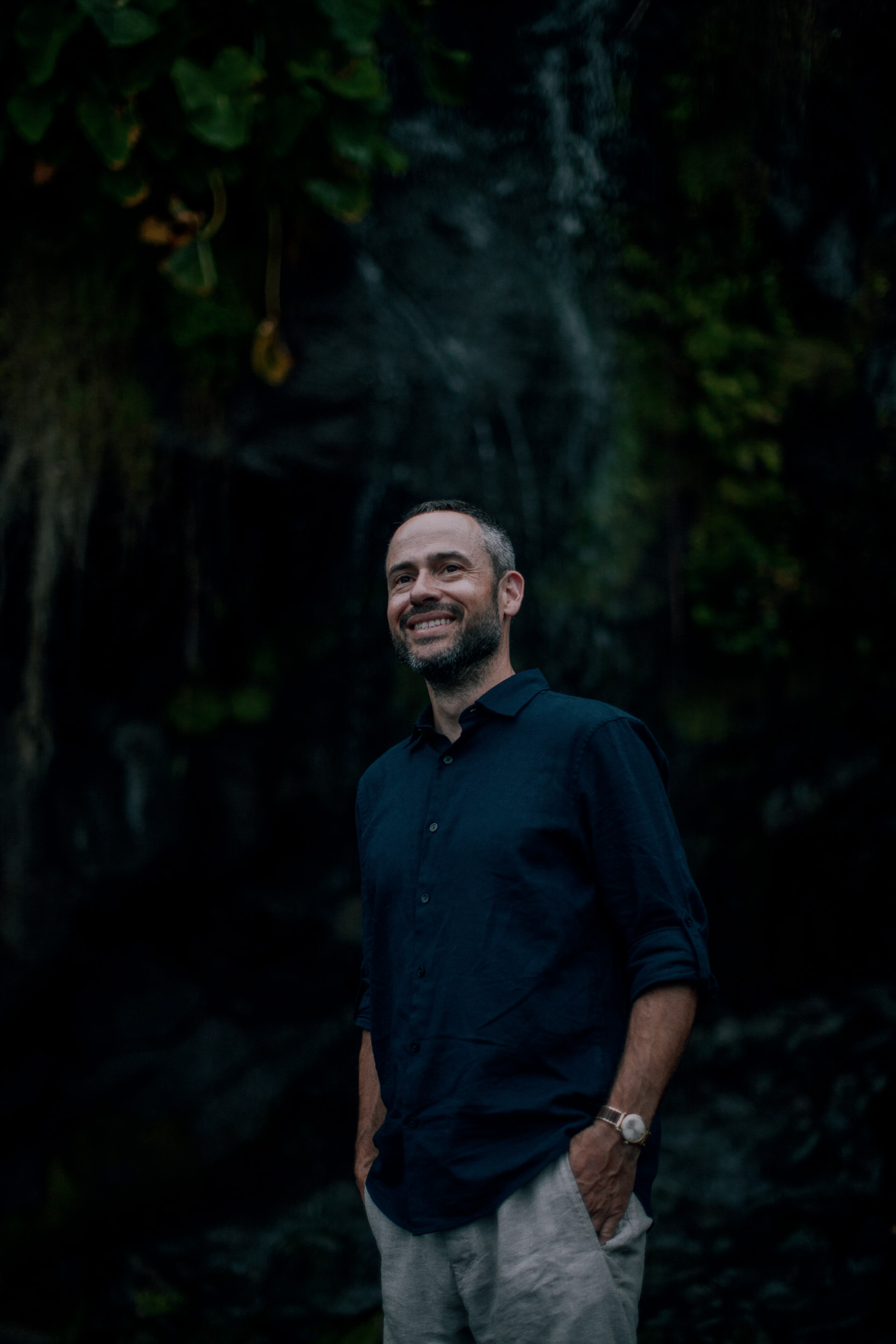 Portrait of the father by the waterfall wall, Seixal Beach, Madeira