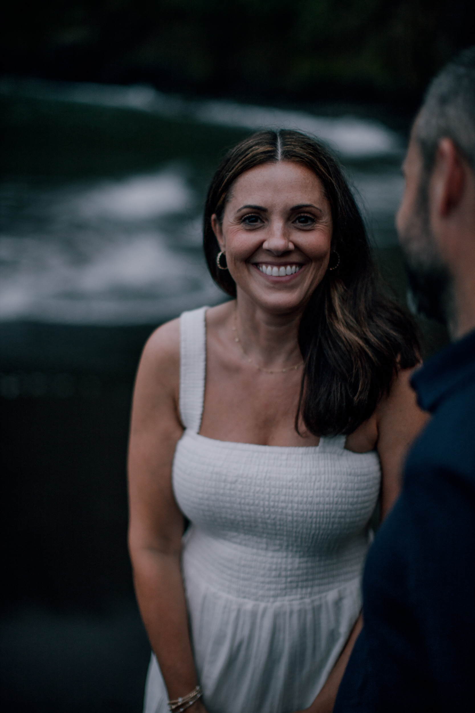 Her smile over his shoulder in the fading light, Seixal, Madeira