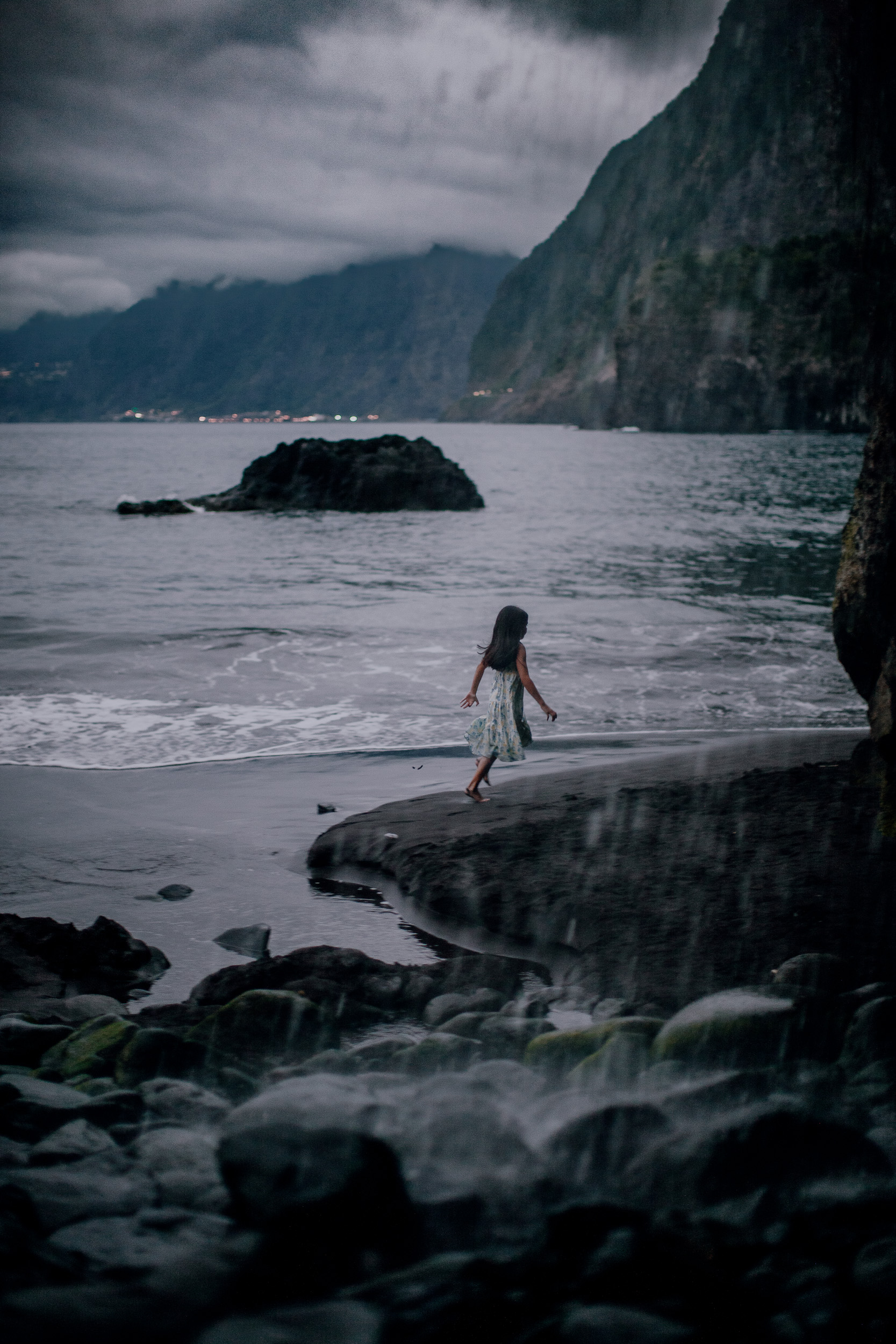 Father and the younger daughter at the sea stack, Seixal, Madeira