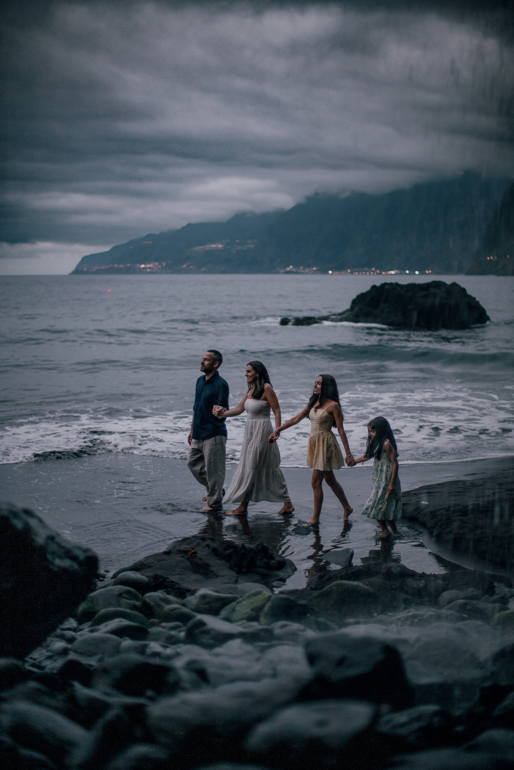 All four in the darkening surf below the cliffs, Seixal, Madeira