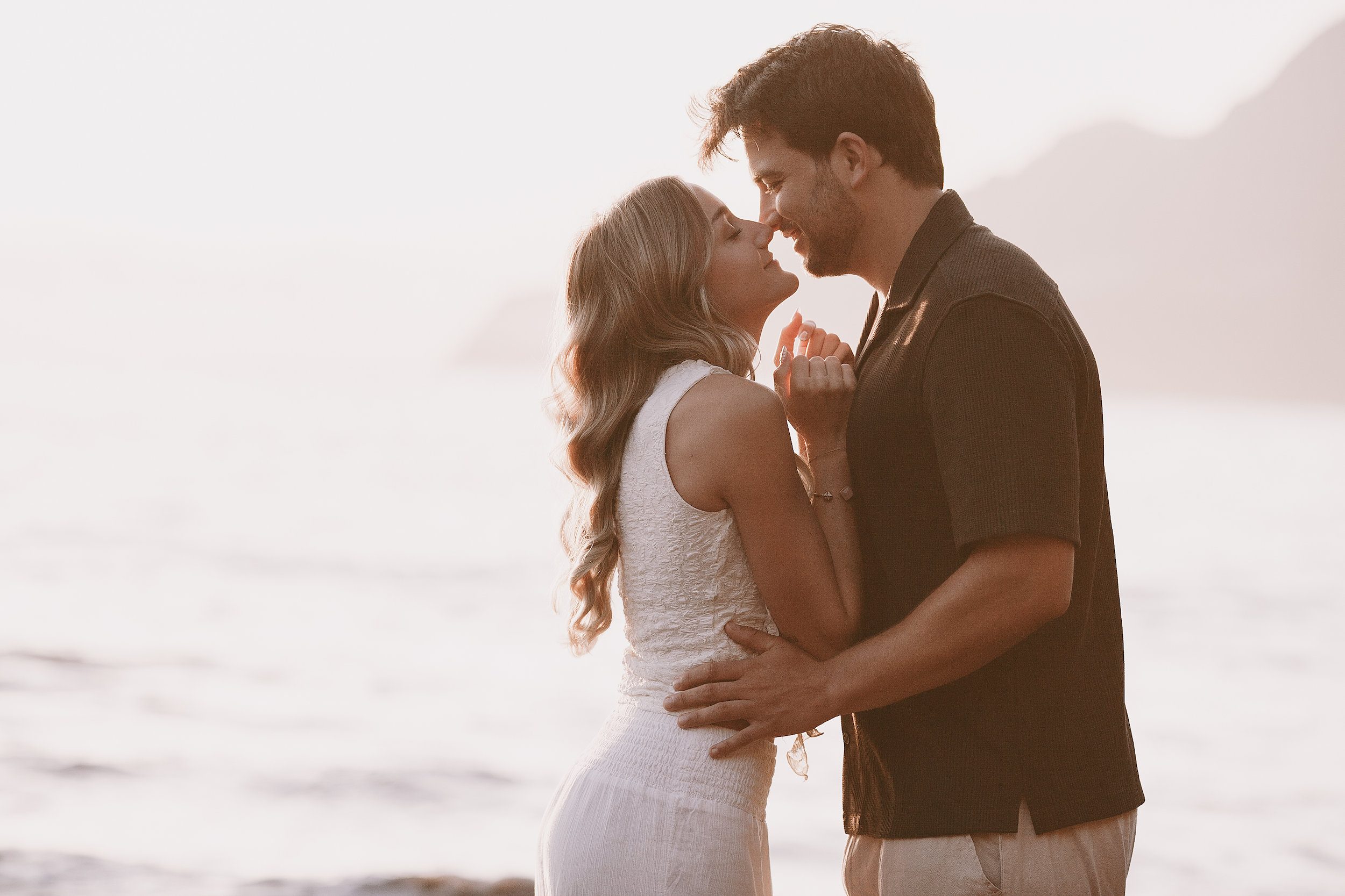 Kissing in the amber light at the shore, Seixal, Madeira