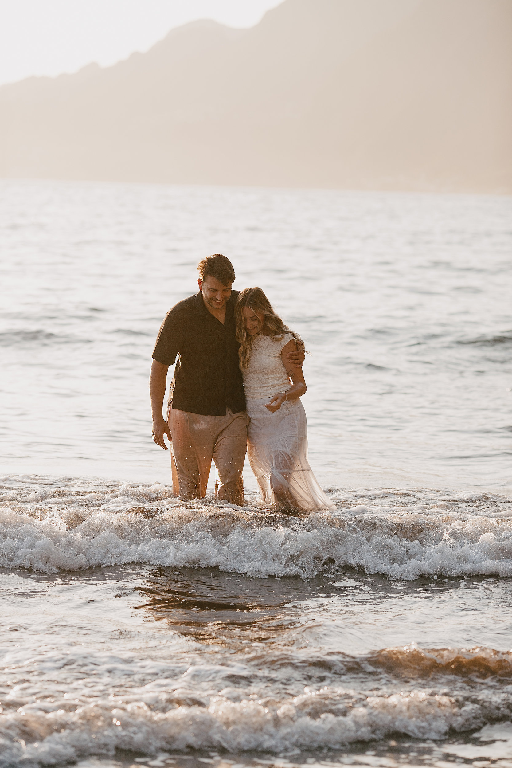 Soaked and laughing in the surf together, Seixal, Madeira