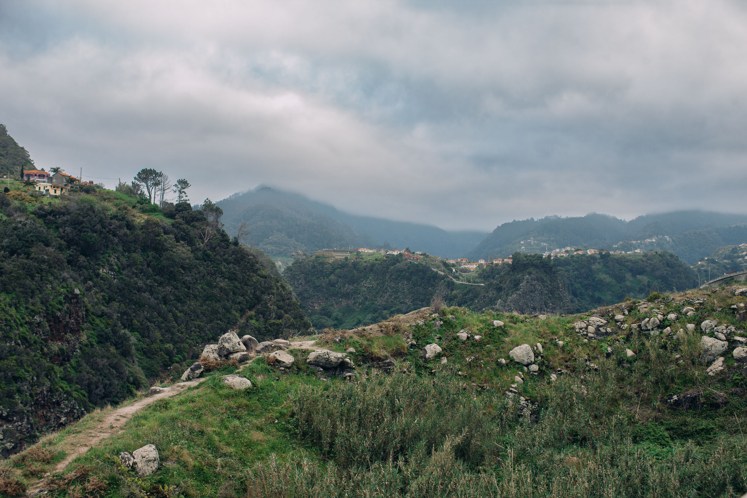 Rocky hillside and Atlantic coastline at Miradouro do Guindaste, Funchal, Madeira