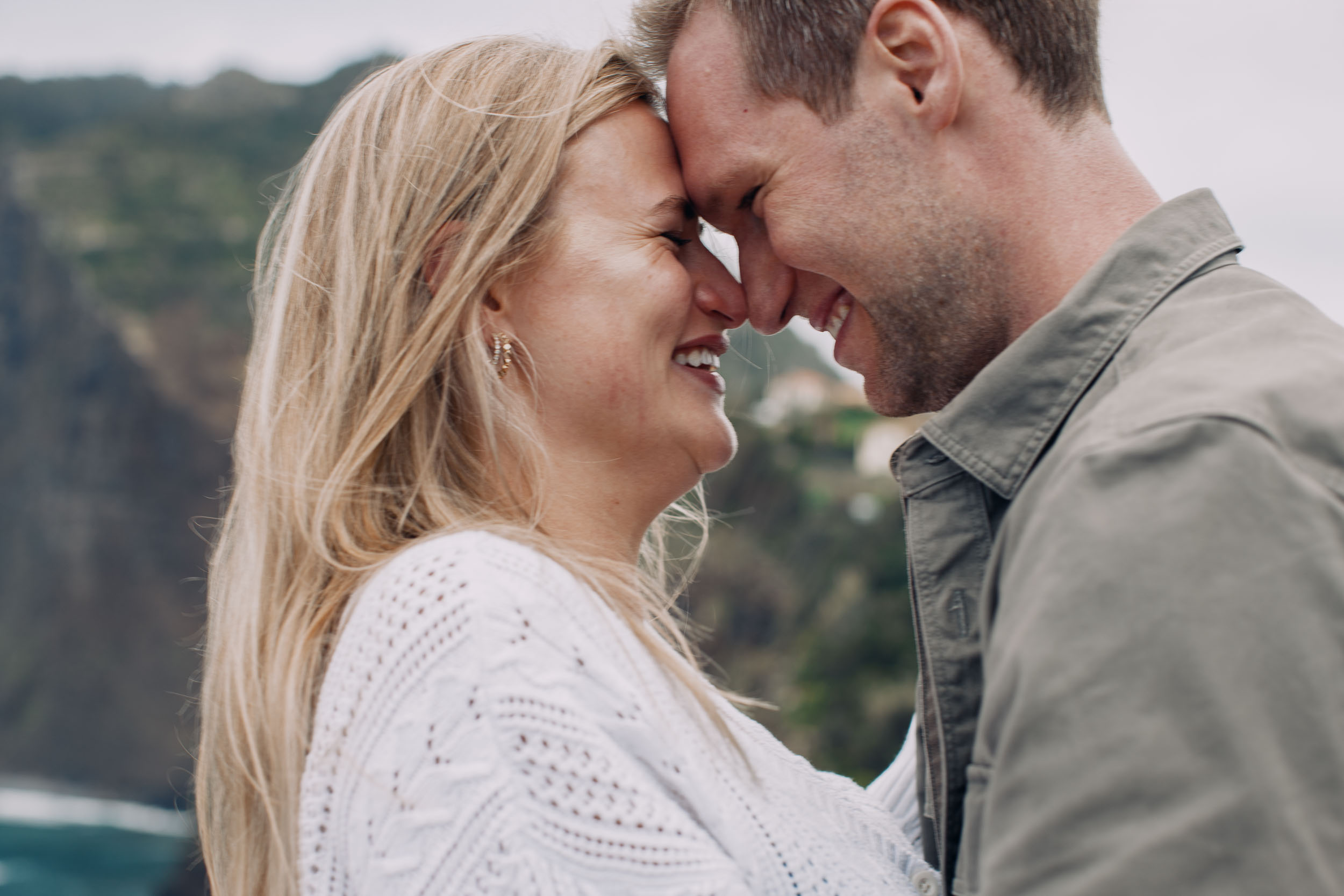 Couple at rocky coastline above Funchal, Madeira