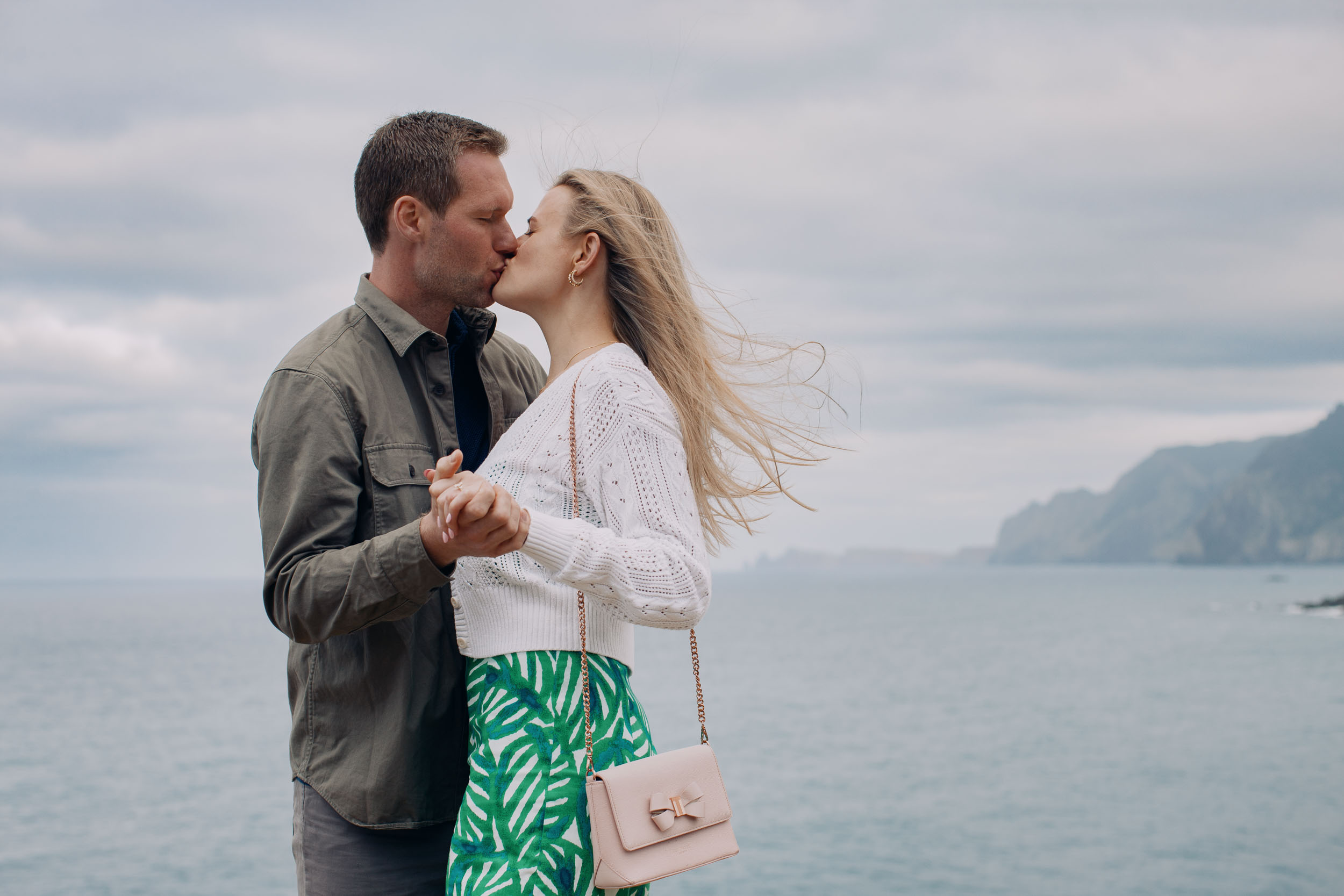 Couple at rocky coastline above Funchal, Madeira