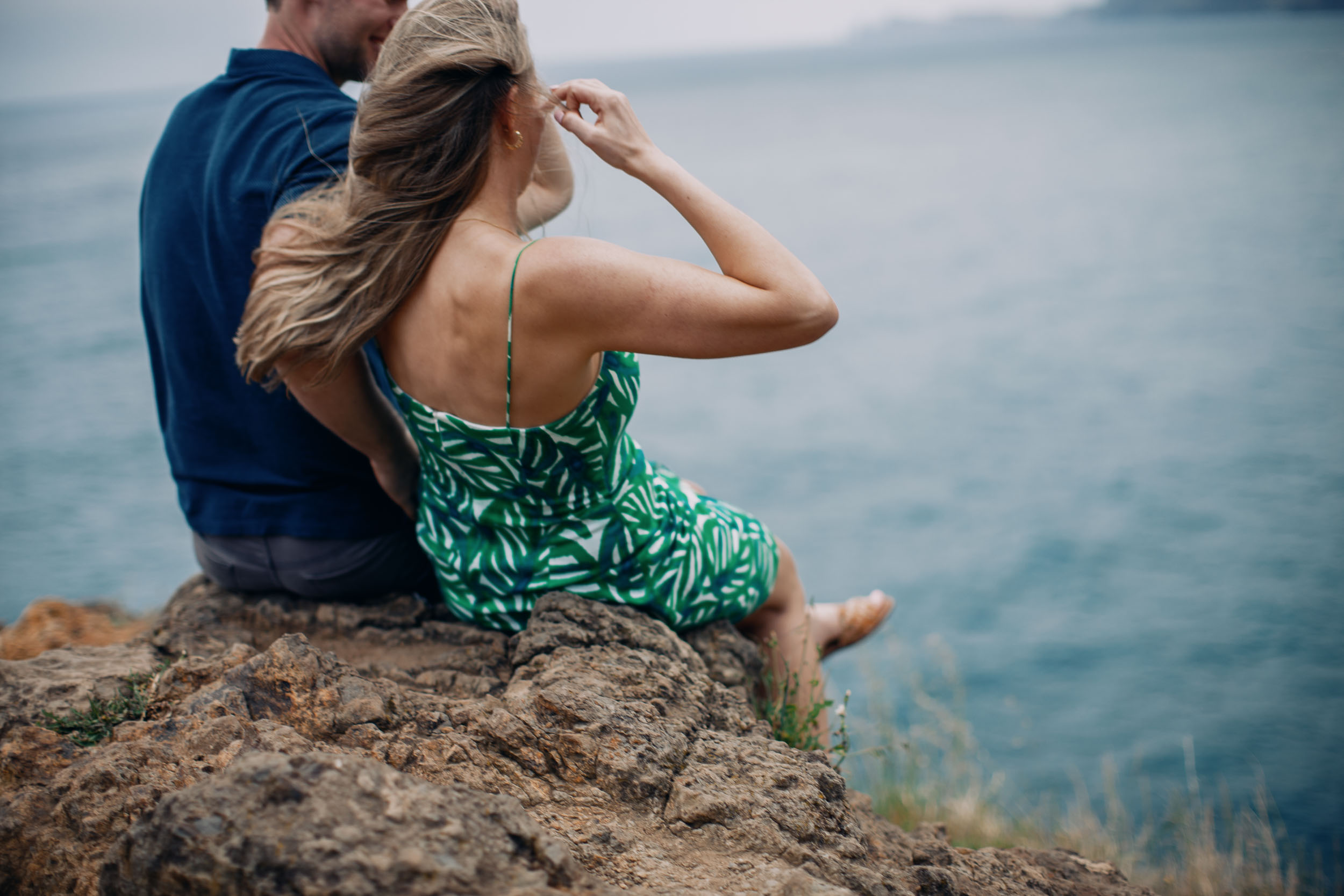 Couple at rocky coastline above Funchal, Madeira