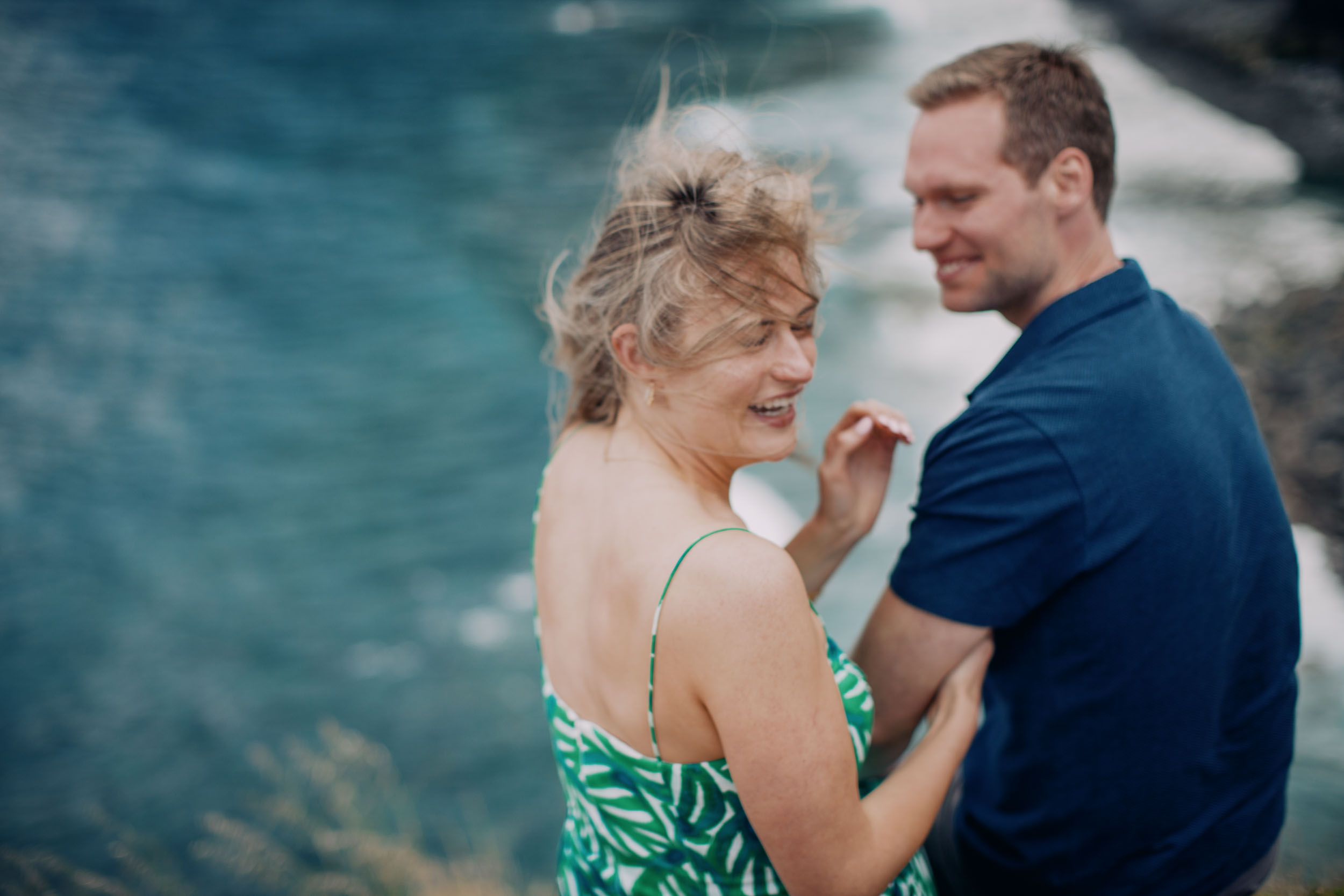 Couple at rocky coastline above Funchal, Madeira