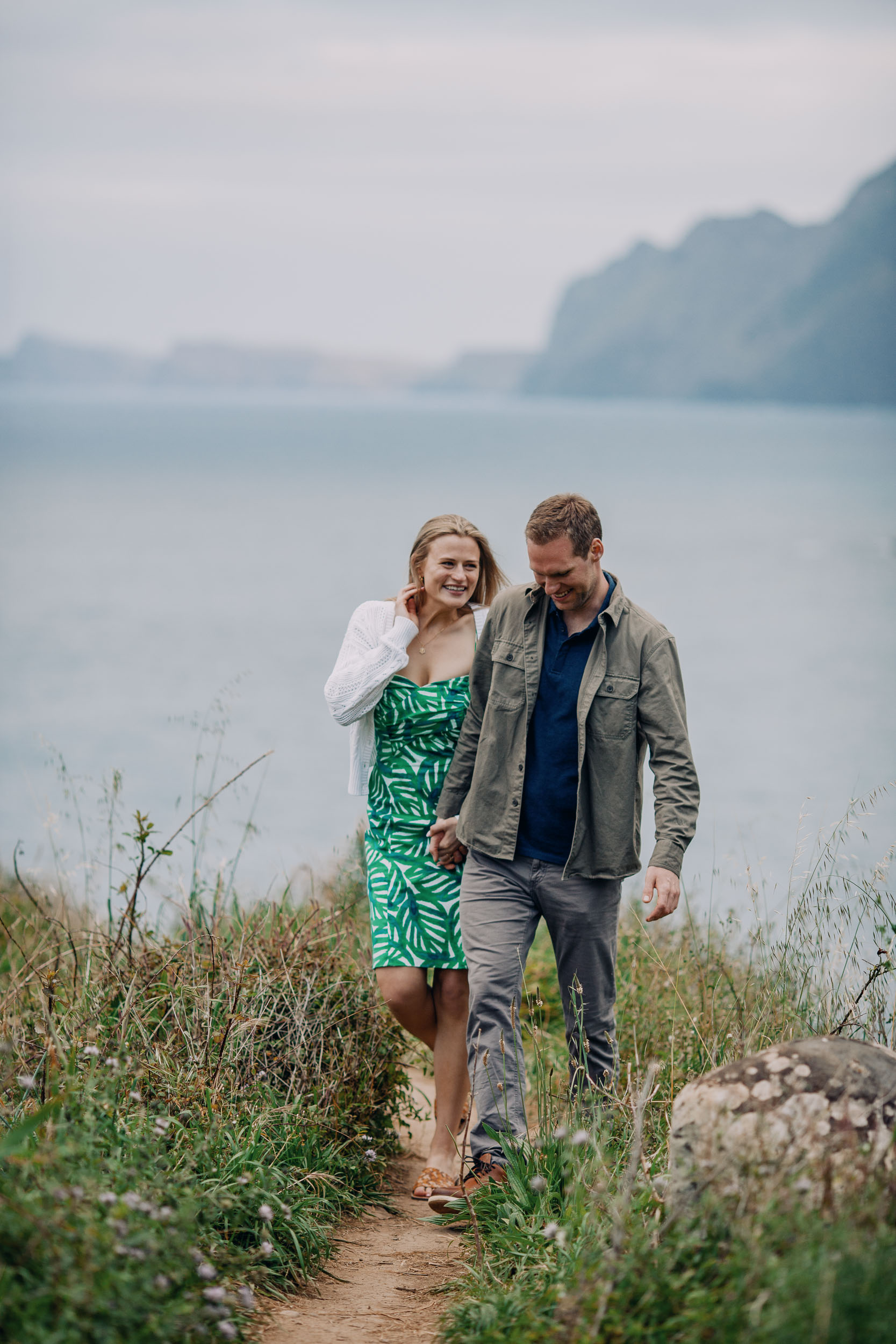 Couple at rocky coastline above Funchal, Madeira