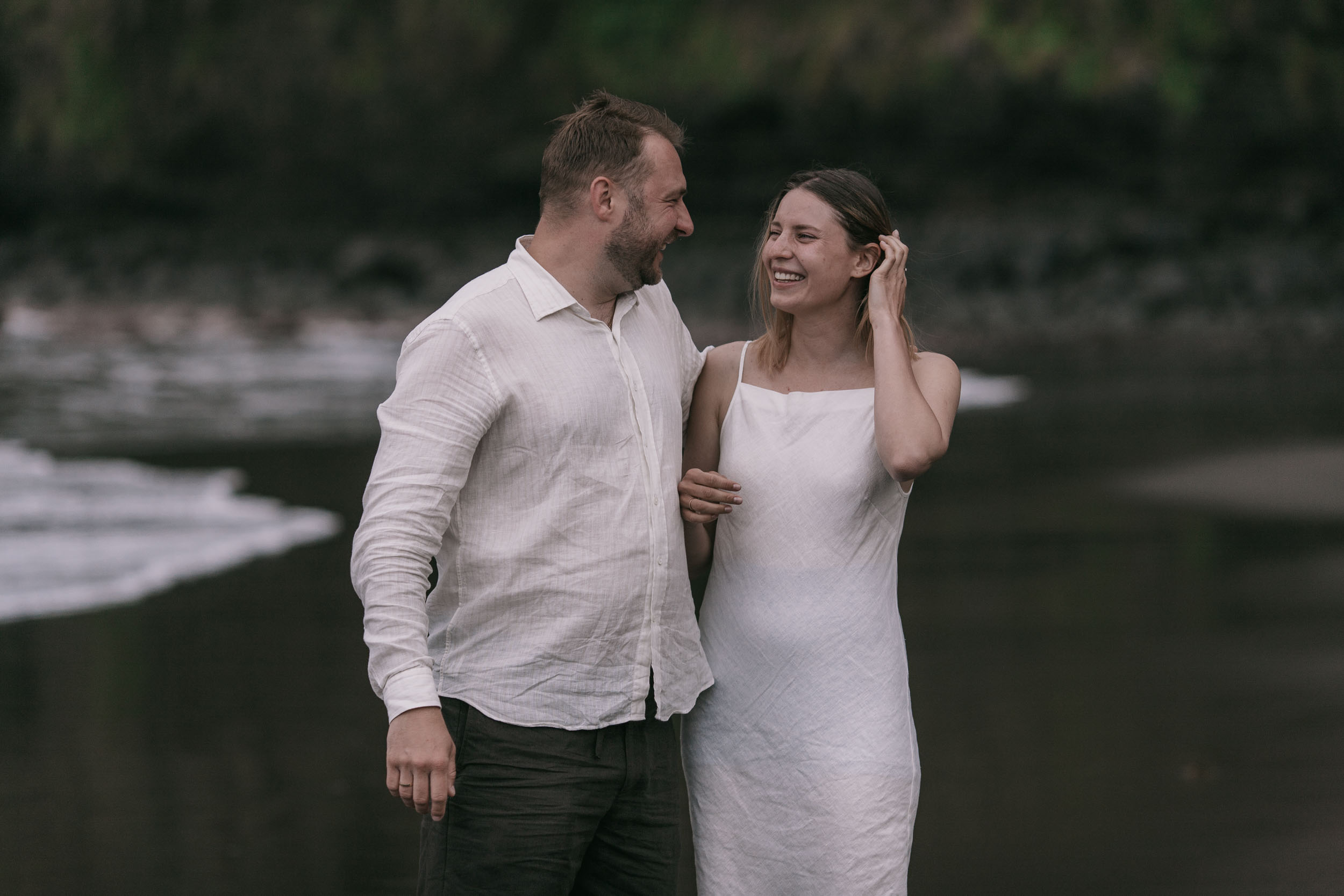 Forehead to forehead at the waterline, dark sand, north Madeira