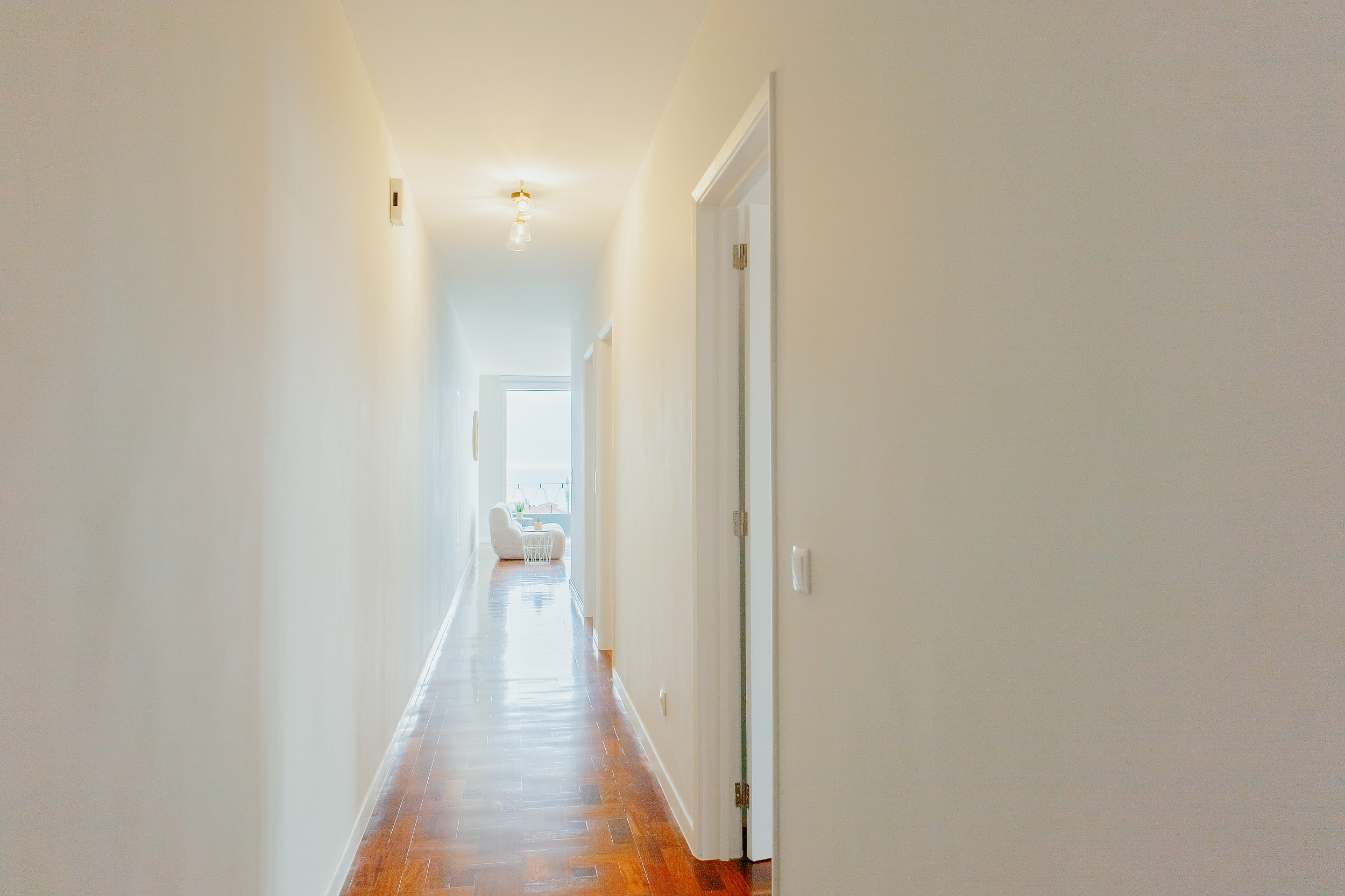 Corridor looking back toward the bright living room